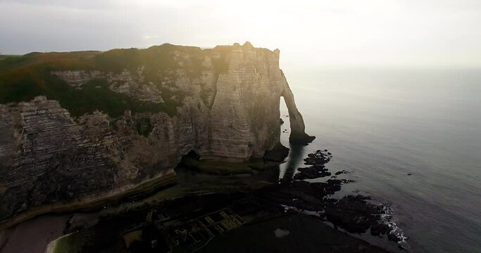 Drone footage of the cliffs (Elephant Cliff) of &Eacute;tretat, France. Aerial top down view of &Eacute;tretat chalk cliff called L'Aiguille or Needle in Normandy. 

