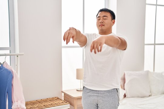 Young Chinese Man Somnambulist Sleepwalking At Bedroom