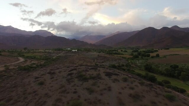 Magical view of the Andes cordillera. Aerial view of the desert, valley and mountains at sunset.
