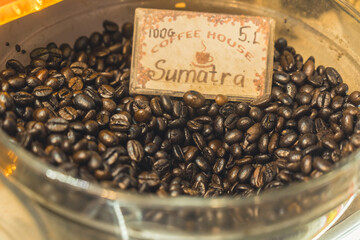 closeup view of Sumatra coffee beans for sale. High quality photo - obrazy, fototapety, plakaty