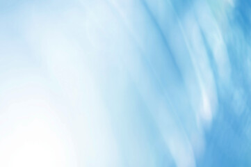 Light blue Leaf background. Blurred leaves and circular bokeh. Abstract wallpaper for backdrop and design