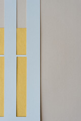 gray paper stripes on yellow and gray beige paper