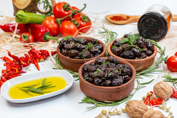 black olives, olive oil, tomato, honey, walnut, concept