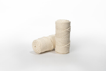 Fototapeta na wymiar Macrame Thread, white background, close-up, cylindrical roll format, can be used for e-commerce