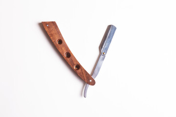 Beard razor with wooden handle, isolated with white background, barber hairdressing equipment beard razor