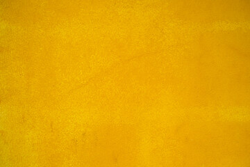 Yellow painted cement wall texture and gray color. Yellow and gray plaster walls are rough.