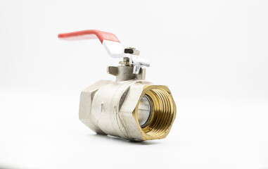 Stainless ball valve two way. Water valve isolated on white background. Valve with red handle.