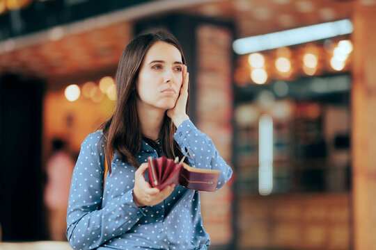 Broke Woman Looking in her Waller for some Coins Left