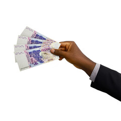 Black Hand with suit holding 3D rendered 10000 West African CFA Franc notes isolated on white background.