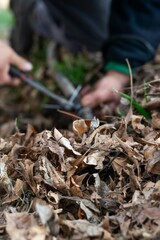 MAN FIXING A DRAINAGE PROBLEM 