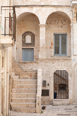 Beautiful old town of Italy, windows and doors, Historical part of city, Vertical photo