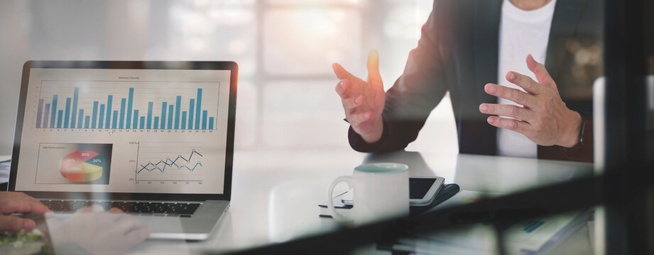 Cropped shot of Business people working together in boardroom, brainstorming, discussing and analyzing and planning business strategy.