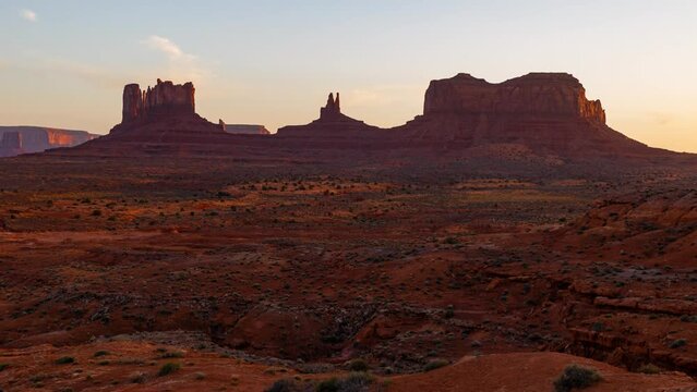 Time lapse of towering mesas at sunset in Monument Valley in Arizona, USA