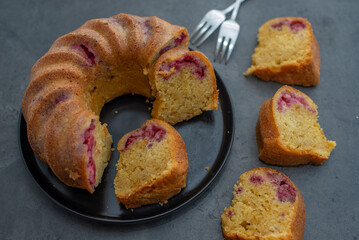 sweet home made sponge cake with raspberries