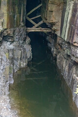 A few looking into an old silver mine in the small historic town of Cobalt, Ontario.