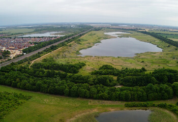 Aerial Footage of Stewartby Lake of England, Landscape at Sunrise
