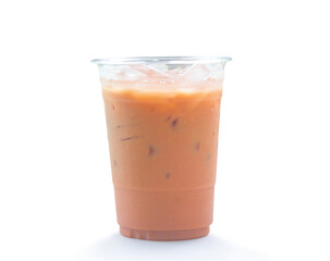 Orange Thai iced condensed milk tea in transparent plastic glass isolated on white background with clipping path