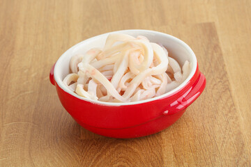 Marinated squid strips in the bowl