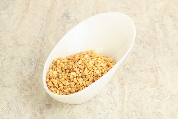 Crunched roasted peanut in the bowl
