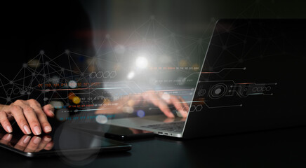 Concept of digital technology and software development. Coding programmer, software engineer, internet of things, working on laptop with circuit board and javascript on virtual screen IoT