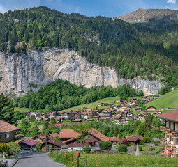 Landscape of  Lauterbrunnen village, the Staubbach Fall  and the Lauterbrunnen Wall in Swiss Alps,...