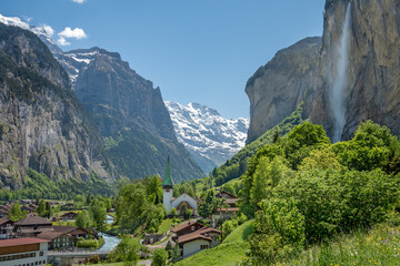 Landscape of  Lauterbrunnen village, the Staubbach Fall  and the Lauterbrunnen Wall in Swiss Alps, Switzerland.