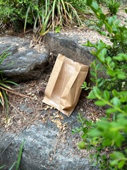 It's a paper bag between rocks.