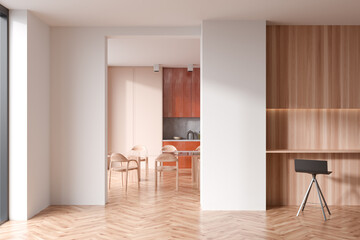 Stylish kitchen interior with bar chair, eating table and seats on wooden floor