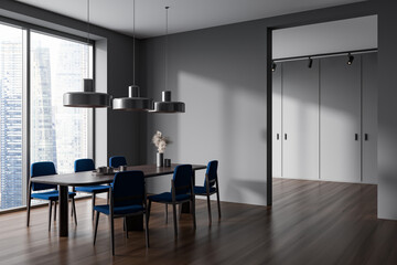 Grey dining room interior with table and chairs, panoramic window