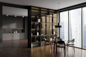 Grey kitchen interior with eating table and seats, shelf and panoramic window