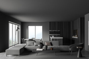 Grey kitchen interior with couch and eating area, panoramic window