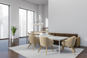 Stylish kitchen interior with eating table and couch, panoramic window. Mockup wall