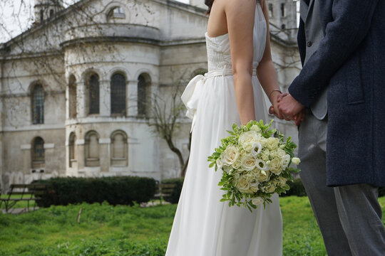 Newly married couple of different nationalities Out for a prewedding photoshoot in London. The man is British Asian women