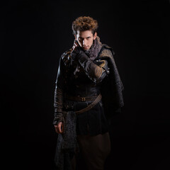 A guy in a steampunk or post-apocalyptic image, portrait on a black background