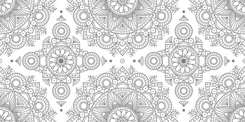 Ethnic floral seamless pattern with mandalas