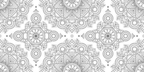Ethnic floral seamless pattern with mandalas