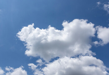 White clouds against a blue sky