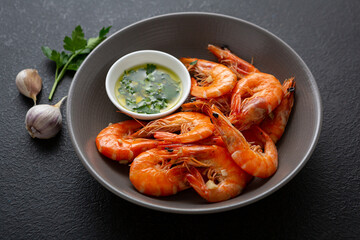 Close up of prawn with sauce garlic parsley