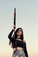 Girl with a gun in her hands