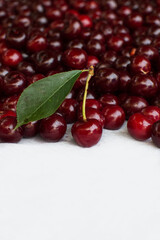 Ripe cherries close-up on a background of cherries.Summer vitamins