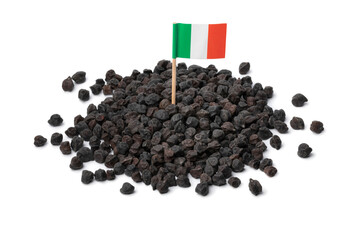 Heap of black chickpea Murgia, ceci nero, also known by the name of cece del solco dritto , with the italian flag in top isolated on white background 