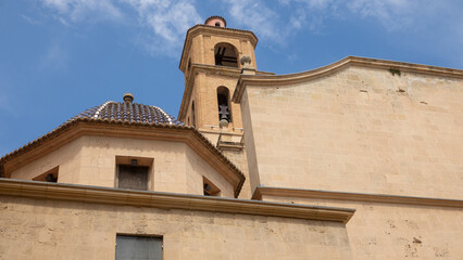 Exterior of a lovely dome atop a building in the Old Town of Alicante in Spain.