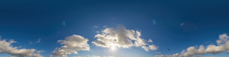 Blue sky panorama with puffy Cumulus clouds. Seamless hdr pano in spherical equirectangular format. Sky dome or zenith for 3D visualization, game and sky replacement for aerial drone 360 panoramas.