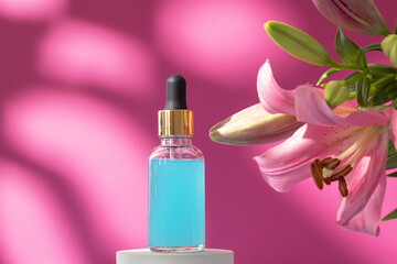 Cosmetic bottle on podium with lily flower and shadow on pink background. Face and body care spa concept. Hyaluronic acid oil, serum with collagen and peptides skin care product