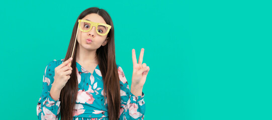 Stay cool. Cool girl hold booth glasses showing victory hand. Enjoying disguise party. Funny teenager child on party, poster banner header with copy space.