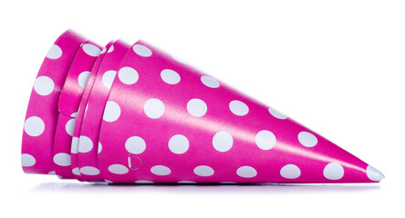Pink birthday caps on white background isolation