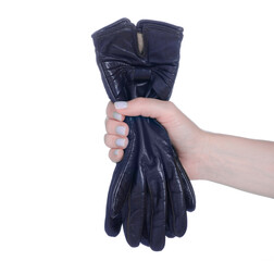 Black leather gloves in female hand on white background isolation