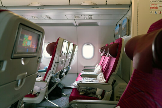 MOSCOW, RUSSIA - CIRCA MAY, 2017: a seat-back screen inside the cabin of Qatar Airways Airbus A321. Qatar Airways, is the state-owned flag carrier of Qatar.