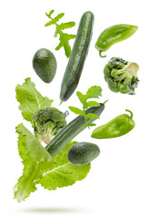 Broccoli, avocado and lettuce are flying on a white background. Isolated