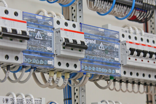 ABB current circuit breakers and voltage distribution busbars in the electrical panel.